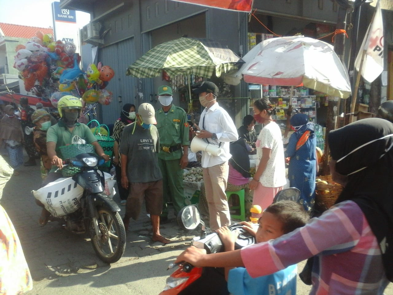 Pengumuman Ke  Pengunjung Pasar Wedung Wajib Pakai Masker